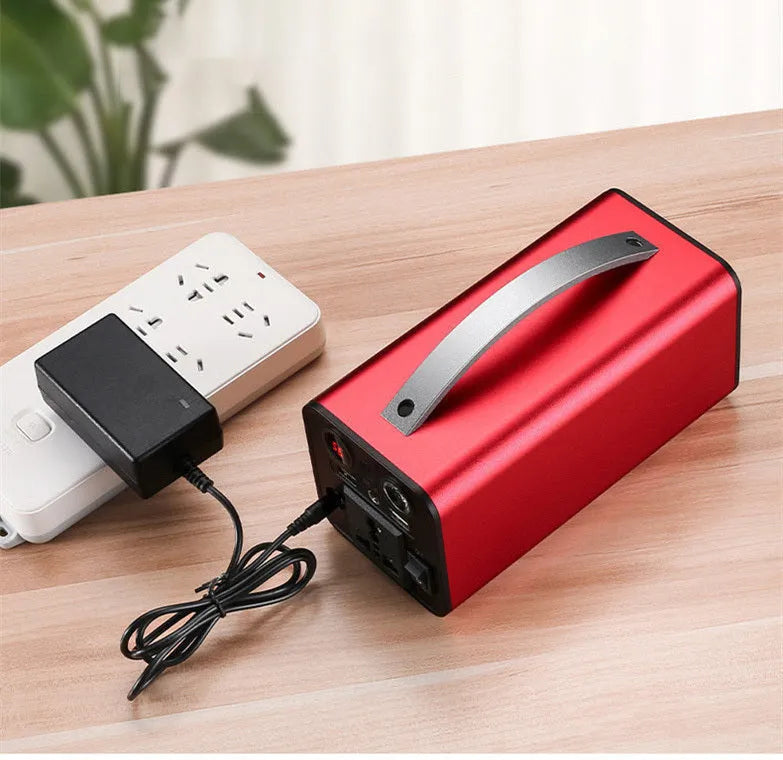Portable 45000mAh power station with AC DC USB outputs and solar input in black colour