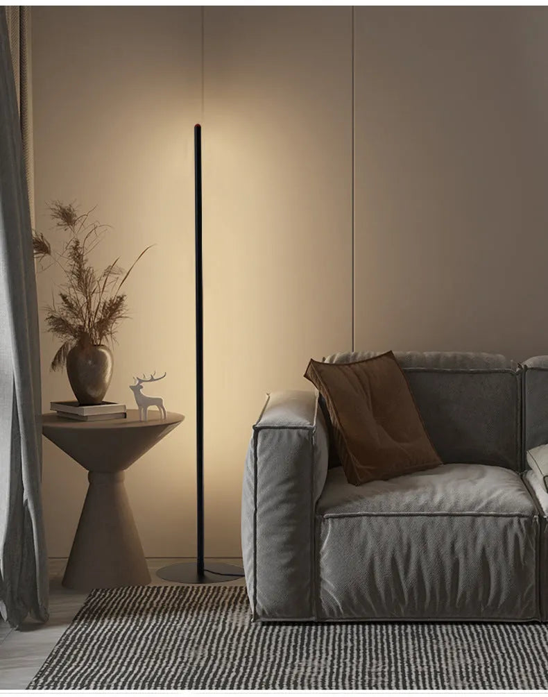 Simple vertical aluminium alloy floor lamp with LED light source on a modern stand.