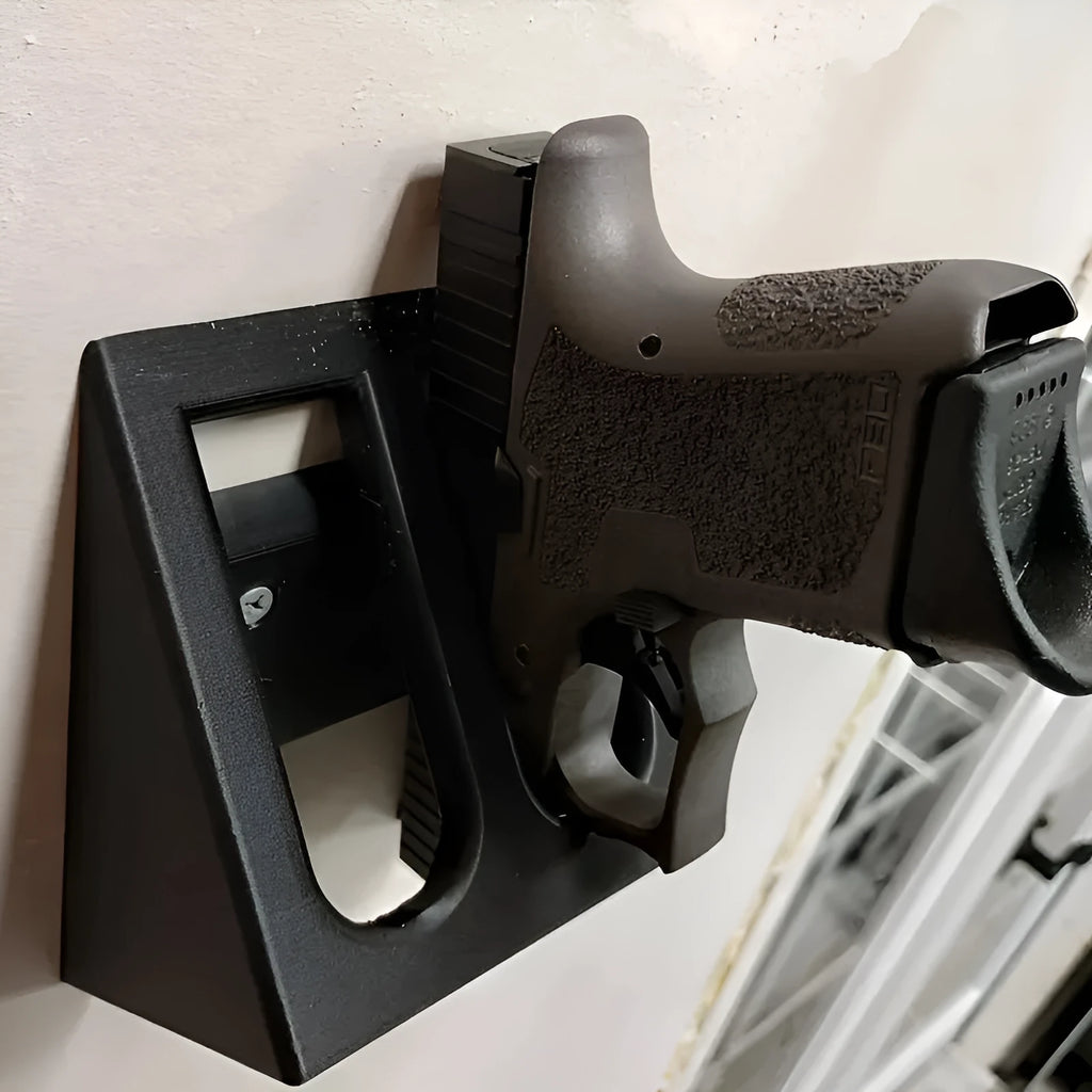 Black punk-style plastic pistol stand for replica firearm display