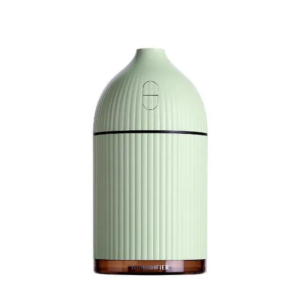 White USB aromatherapy diffuser humidifier with 300ml capacity and LED light on wooden table
