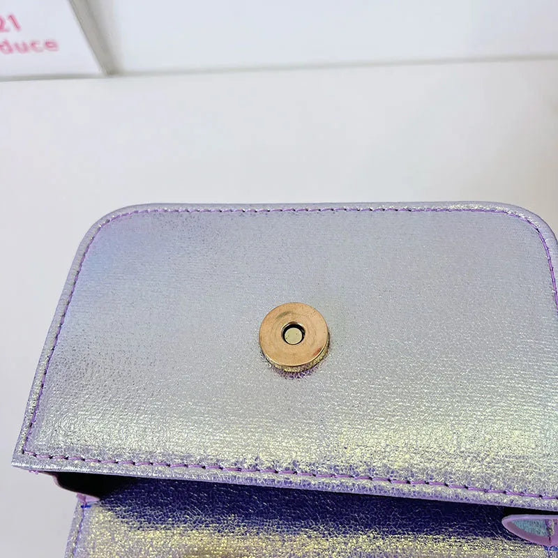 Children's small PU leather shoulder bag with letter print in rose red, showing zipper closure and multiple internal slots