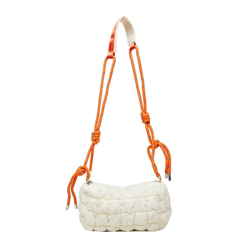 Women's lightweight nylon messenger bag in pillow shape with crossbody strap and rhombus pattern