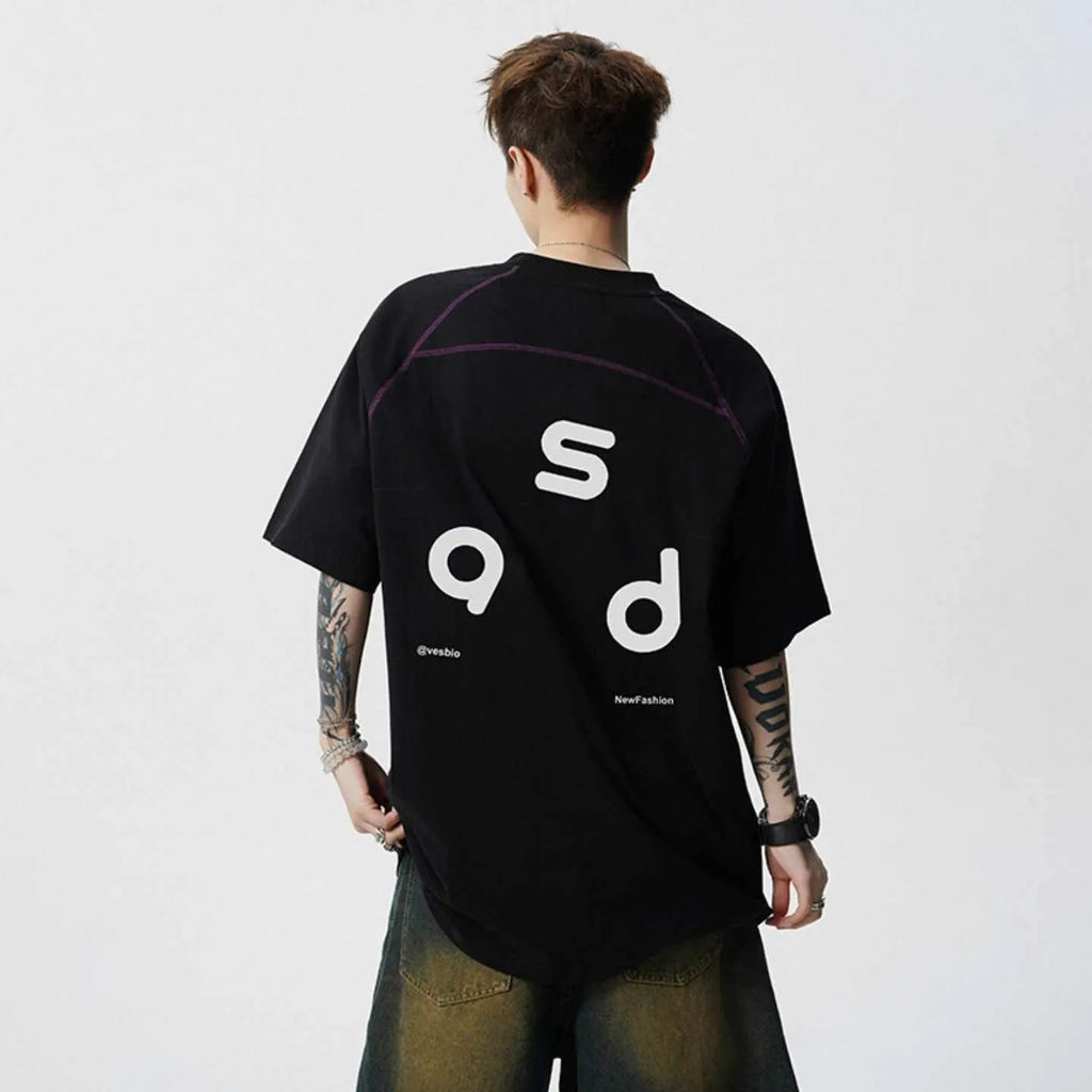 Cotton short-sleeve t-shirt with letter print design in loose fit showing round neck collar