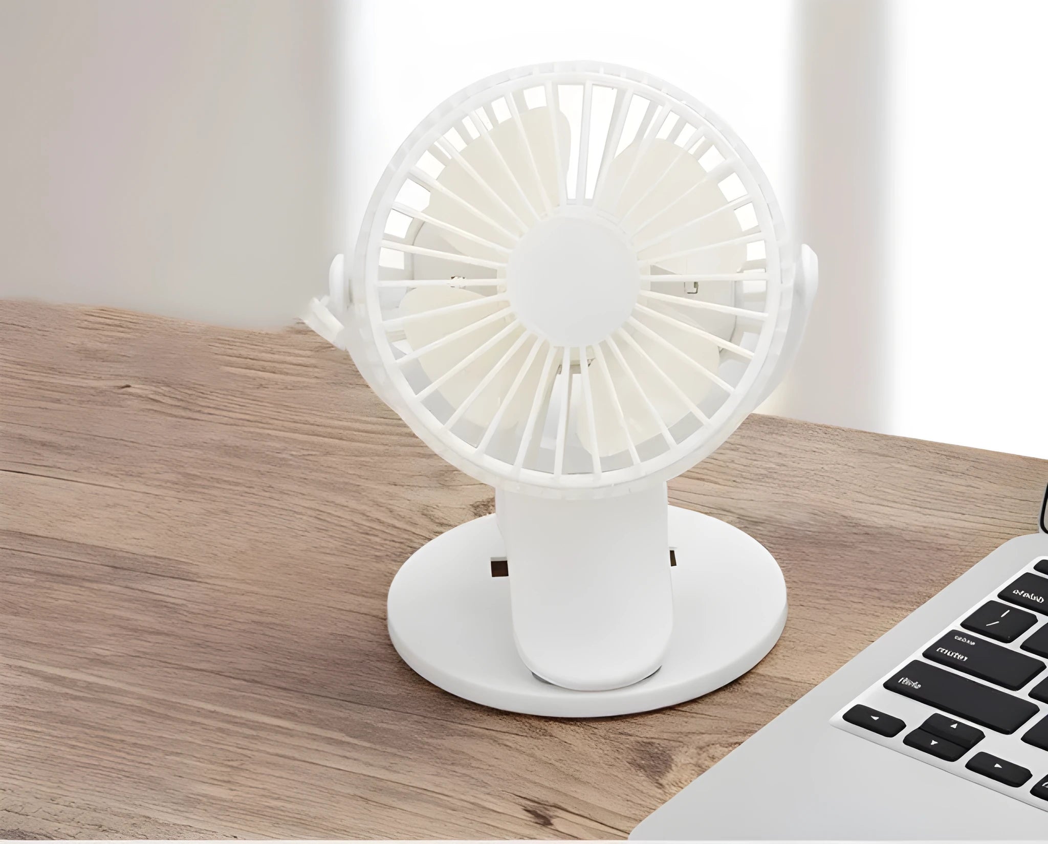 USB rechargeable clip fan in white with battery options for desktop and stroller use