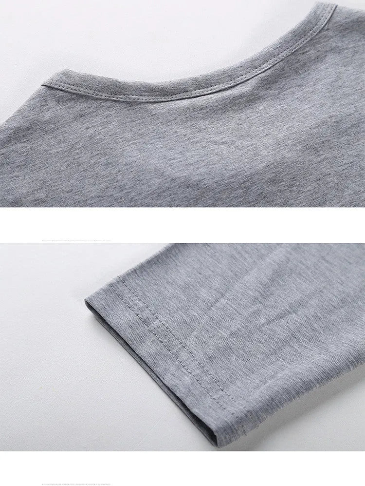 Young men's solid colour linen base shirt in black, sleeveless with striped pattern, worn as casual vest layering piece