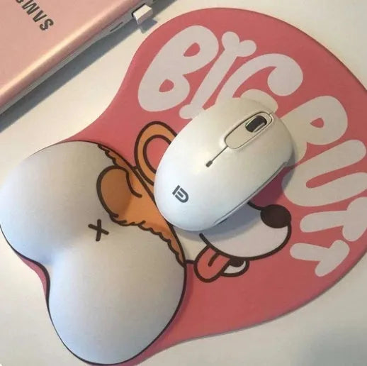 Silicone anime mouse pad with 3D Corgi cartoon design in blue and pink on a desk