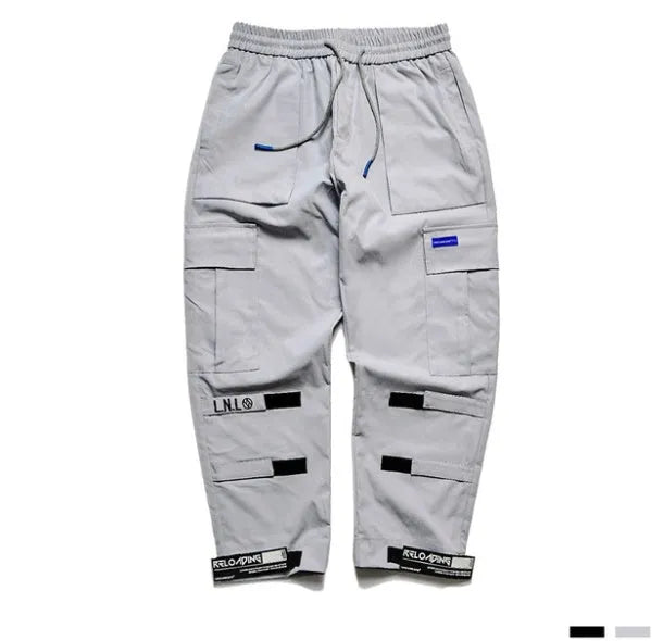 VantageGo black cotton streetwear joggers with elasticated waist, side view on model