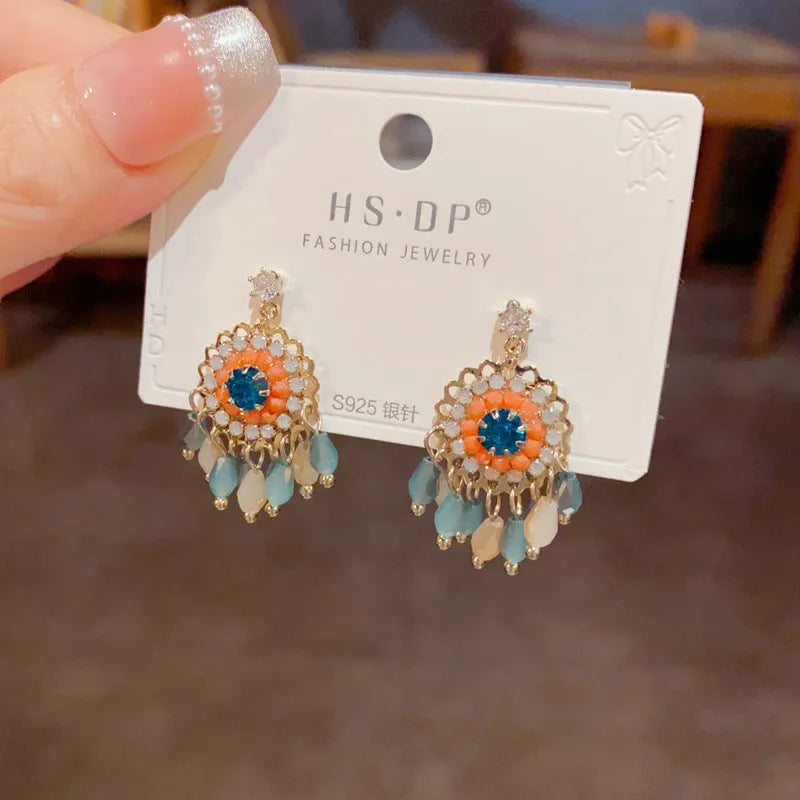 Diamond embedded round crystal tassel earrings in thick gold plated copper, geometric line style for women