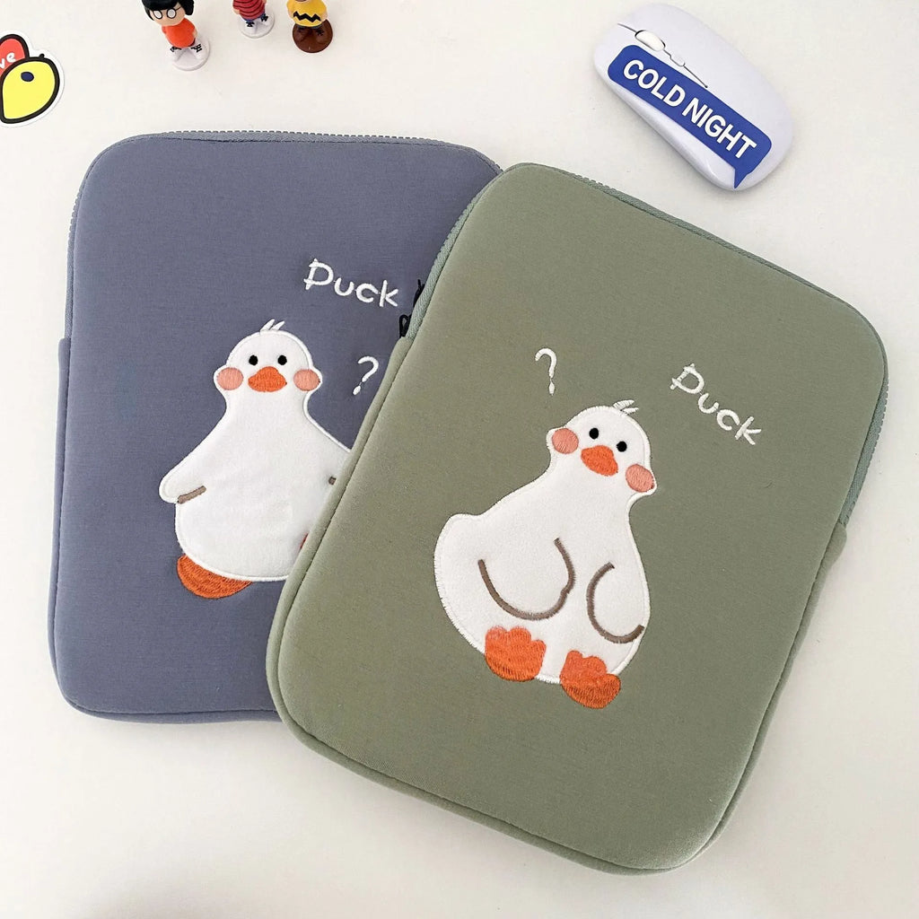 Blue tablet case with embroidered cartoon duck design and zipper closure
