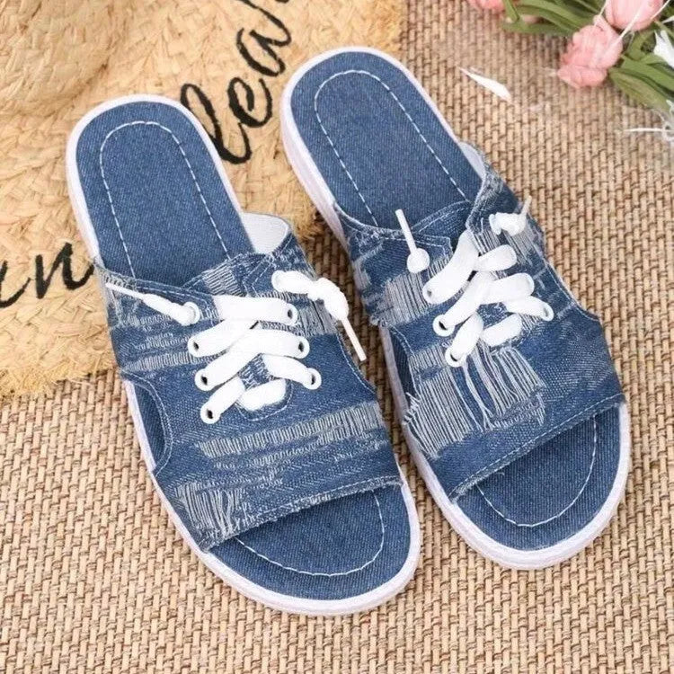 Blue Roman-style women's canvas slippers with cloth lining and rubber sole