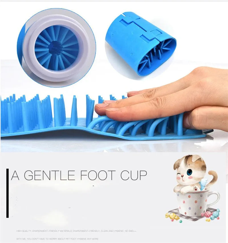 Blue silicone dog paw cleaner cup with soft bristles and easy-grip design on a white surface