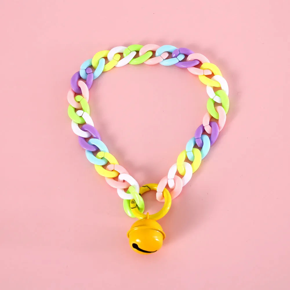 Adjustable plastic pet collar in macaron candy colours for cats, dogs, and rabbits.