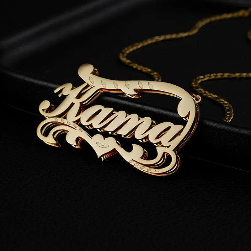 Customised double-layer wave heart stainless steel necklace in gold and silver colour options on a plain background