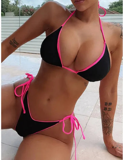 Women's lace-up front triangle bikini top with split bottoms in polyester fabric.