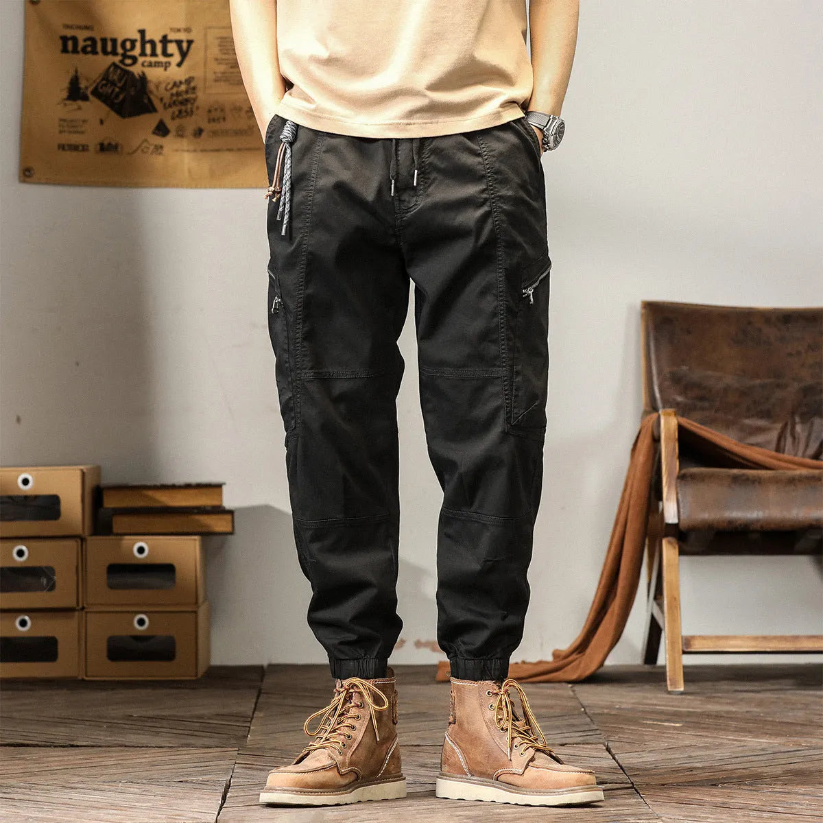 Men's Korean style tapered harem pants in cotton with small leg opening and mid-waist design