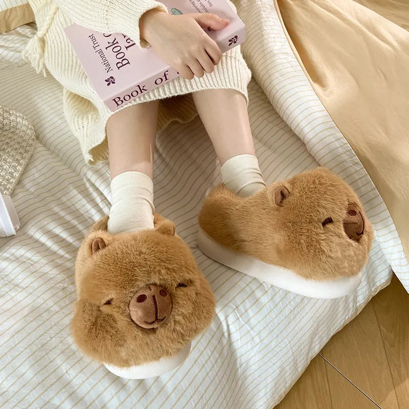 Light brown women's winter slippers with plush upper, artificial wool lining, and PVC sewn soles
