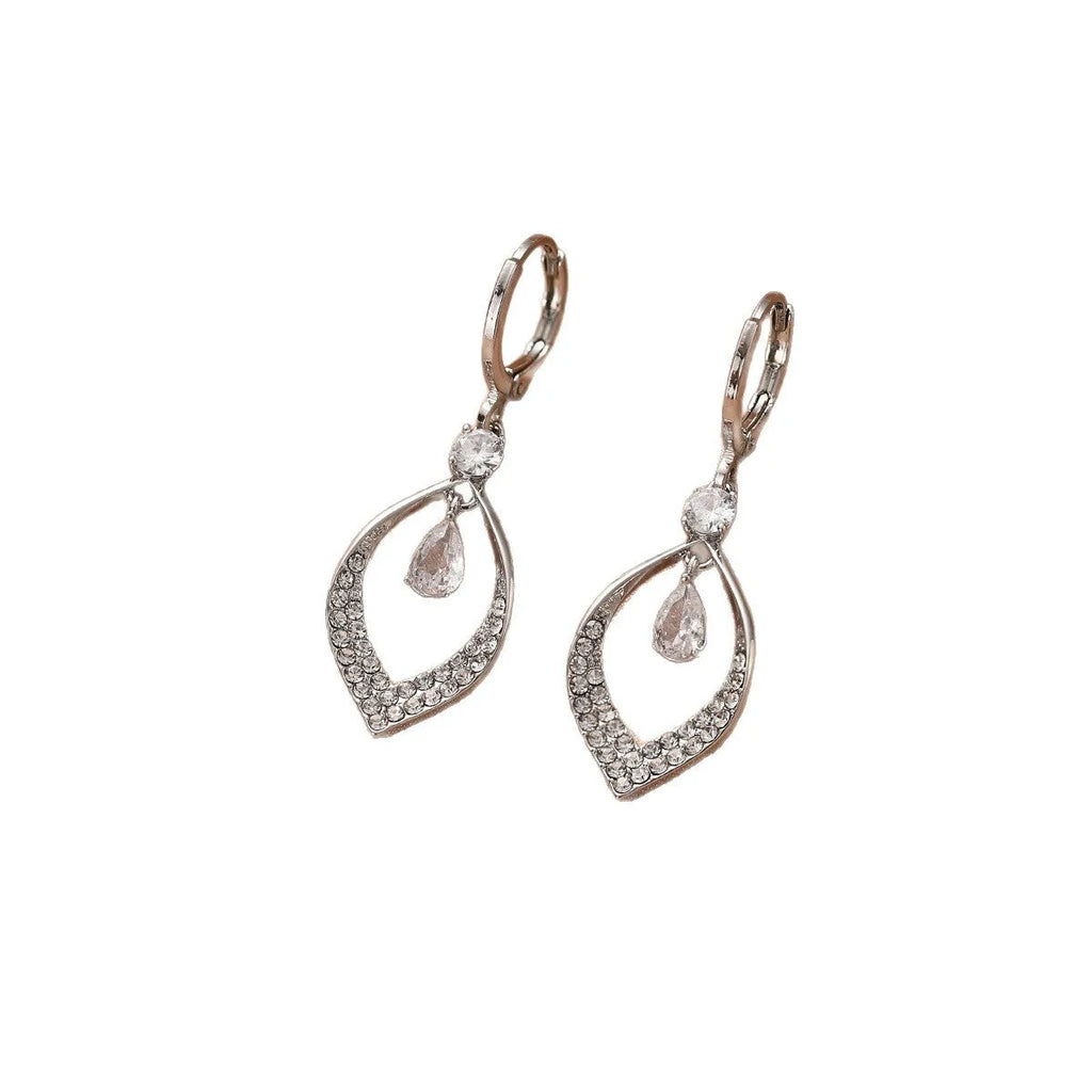 Gold and silver zircon teardrop tassel drop earrings on a copper base.