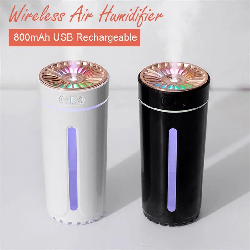 Black and white portable USB rechargeable humidifier with colourful lights for car and desktop use.
