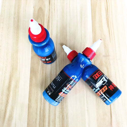 50ml blue automotive scratch repair bottle with integrated wiping tool for vehicle paint touch-up