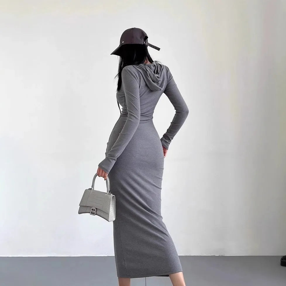 Women's grey hooded sheath dress with long sleeves and a high waist.