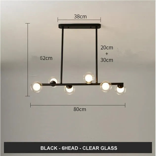 Modern minimalist glass bubble ball chandelier with black iron body and clear glass shades in a Nordic style