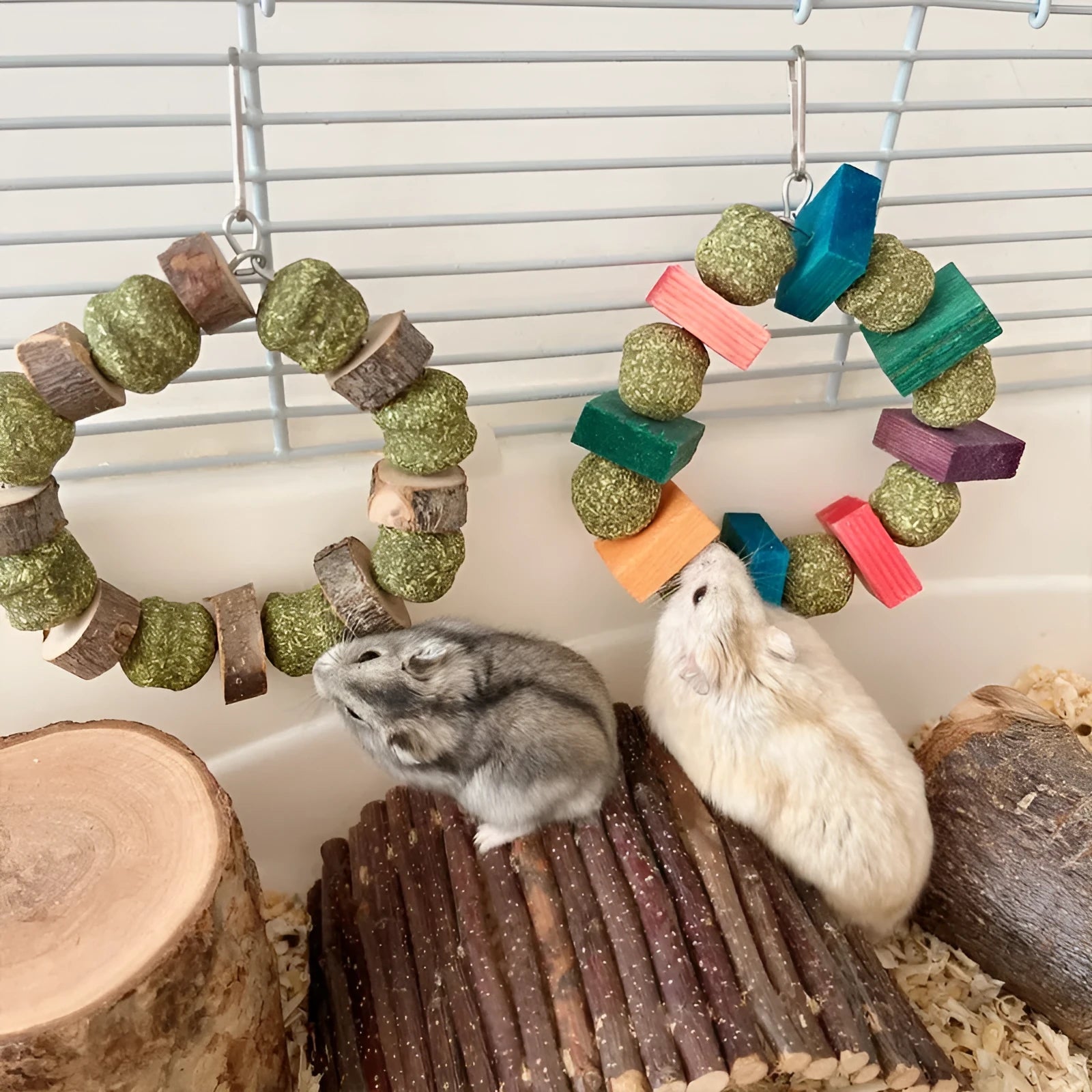 Colourful hamster chewing toy with straw ball rings and applewood rods for small pet dental health