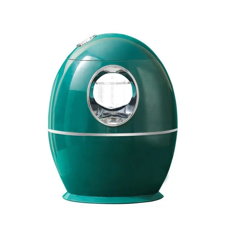White round aromatherapy humidifier with USB cable and water tank showing mist output