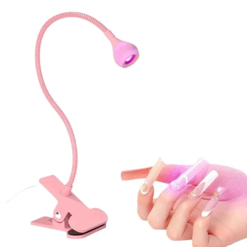 Goose neck nail lamp with USB clip, 395nm purple light curing UV glue on nails in a home manicure setting.