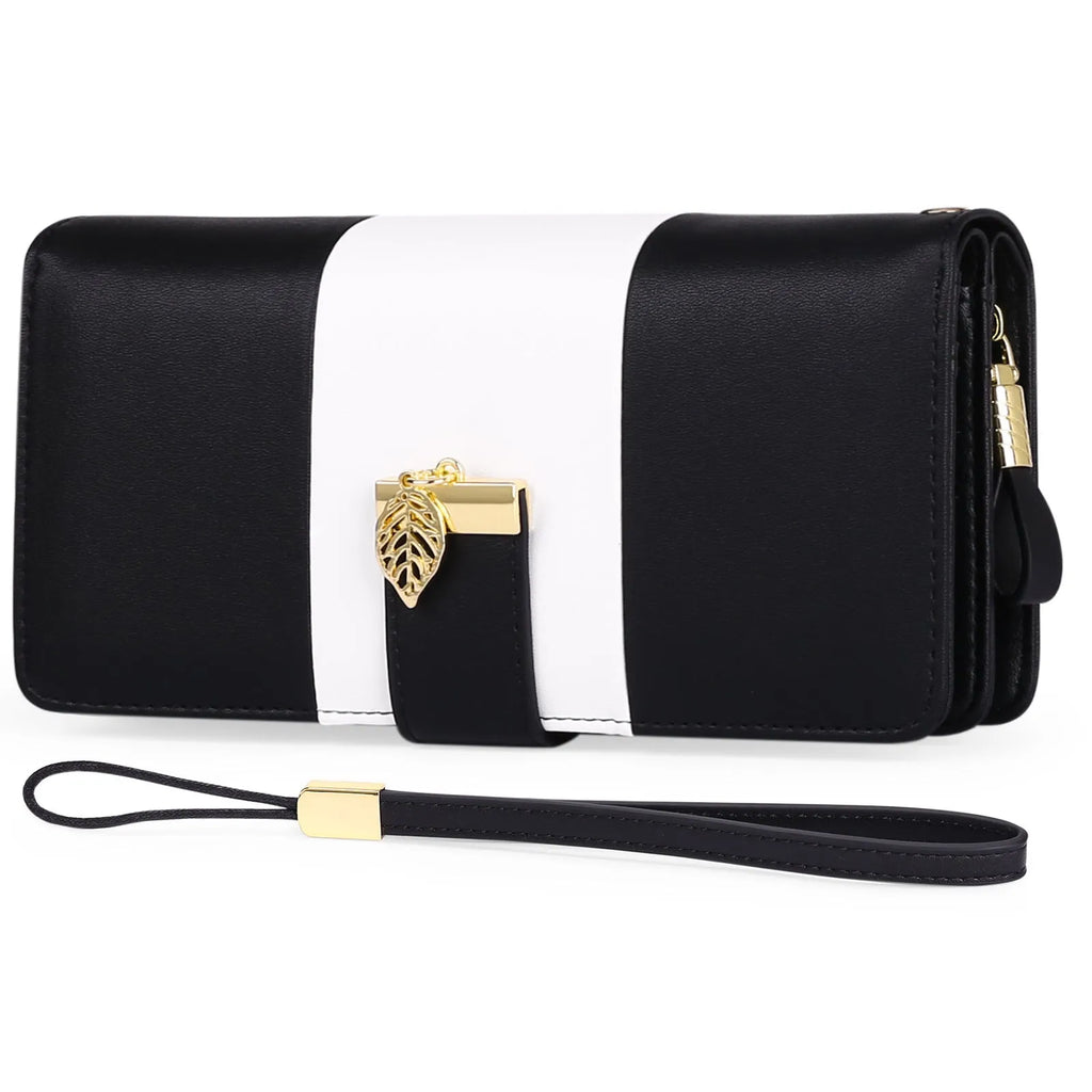 Anti theft brush handbag in PU leather with lock closure, shown in midnight black colour.