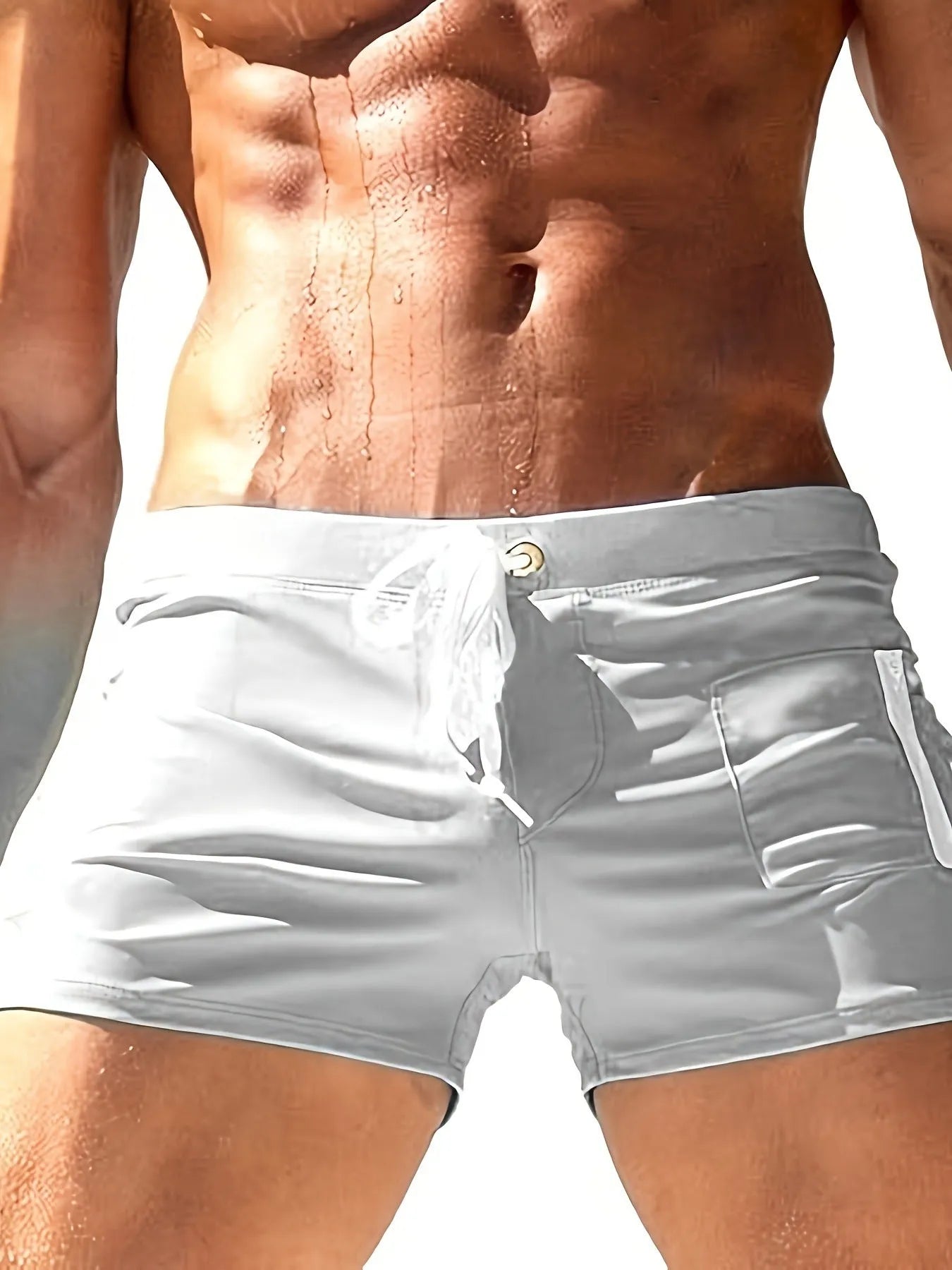 Men's high waist swimming trunks with front lace-up closure in solid colour options