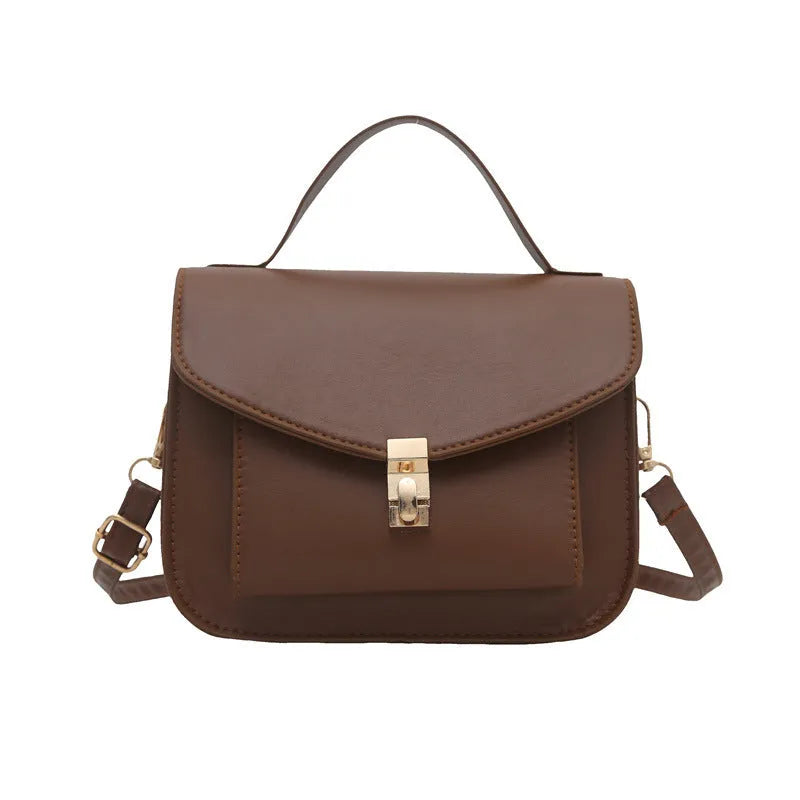 Retro style shoulder messenger bag in horizontal square shape with document compartment