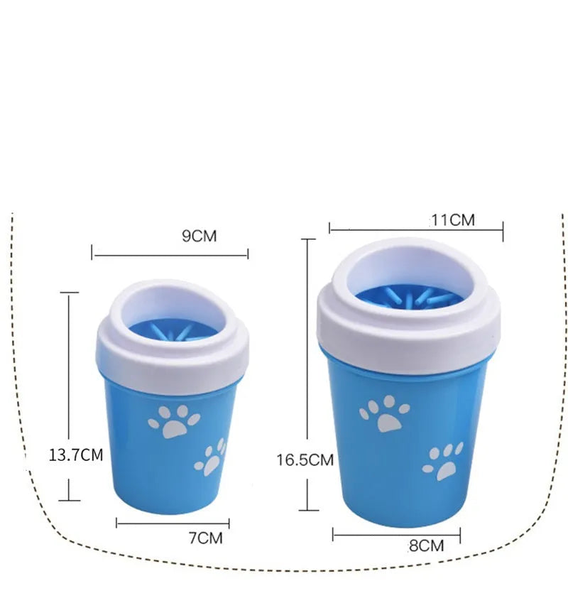 Blue silicone dog paw cleaner cup with soft bristles and easy-grip design on a white surface