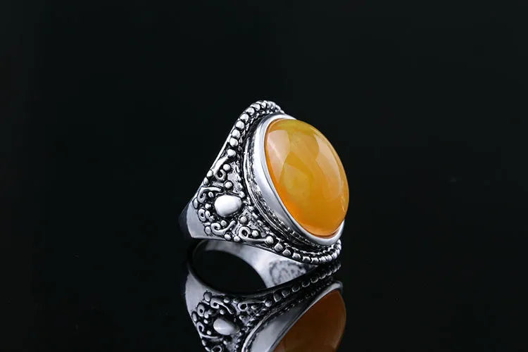 Geometric retro ring with fluorescent beeswax detailing on antique silver electroplated alloy