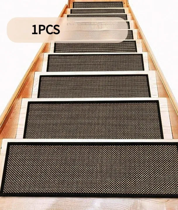 Japanese-style solid-colour linen-look stair mat with rubber backing lying flat on a wooden step.