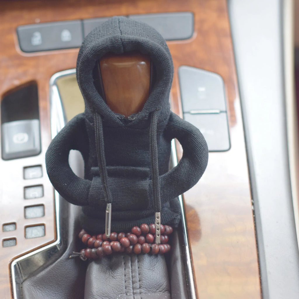 Dutch velvet car gear handle sleeve cover shown in various colours including black, red, blue, and pink.