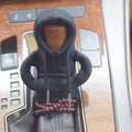 Dutch velvet car gear handle sleeve cover shown in various colours including black, red, blue, and pink.