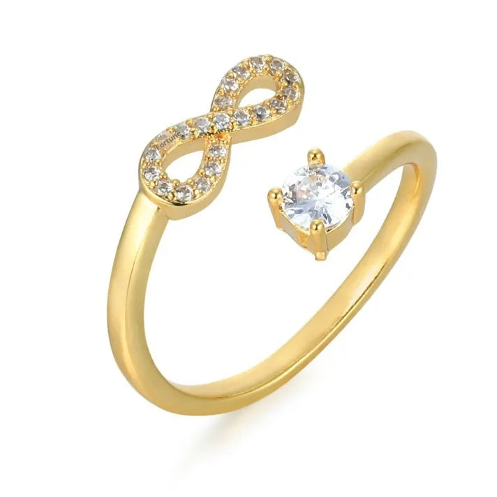 Open geometric initial ring showing a letter on finger, available in gold, rose gold, and silver.
