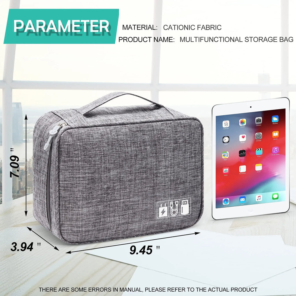 Black waterproof travel cable organiser bag open, showing mesh pockets, elastic loops, and removable padded dividers.