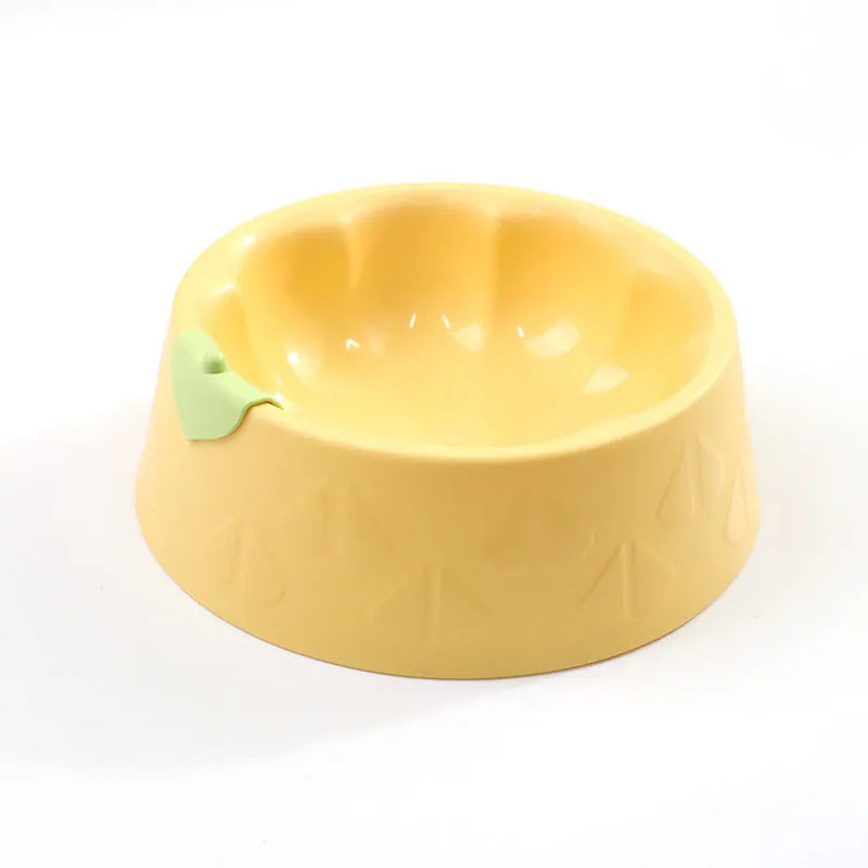 Green plastic double pet bowl feeder for dogs and cats on a white background