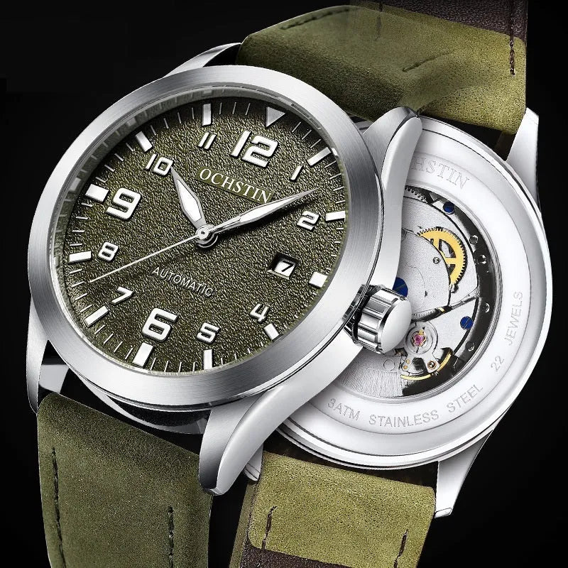 Men's silver case Army Green dial automatic watch with brown leather strap on wrist