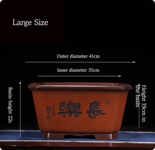 Large Chinese-style purple clay flower pot for indoor bonsai and plants.