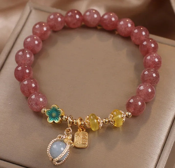 Red strawberry quartz beaded bracelet with alloy components and rhinestone accents for women