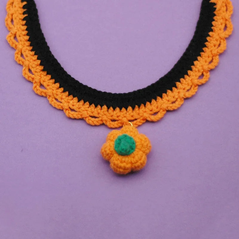 Hand-crocheted wool pet collar in pumpkin colours with adjustable sizing
