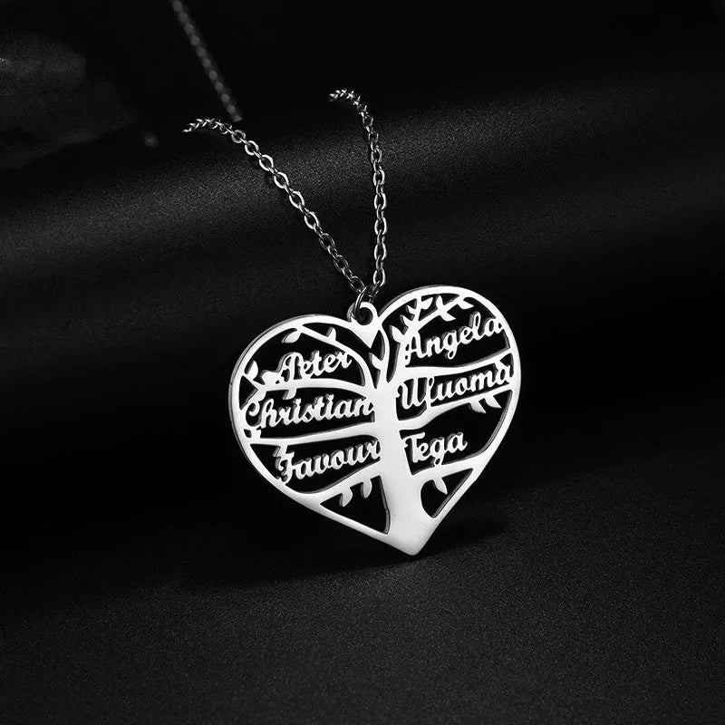 Personalised stainless steel necklace with hollow heart and lucky tree pendant showing custom name engraving