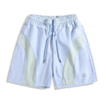 Quick-drying black sports shorts with elastic waistband and straight-leg loose fit for training