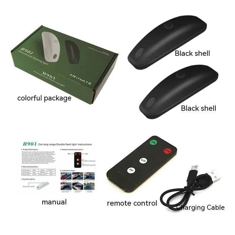 Black and white remote control car LED strobe light with charging cable on a grey background.