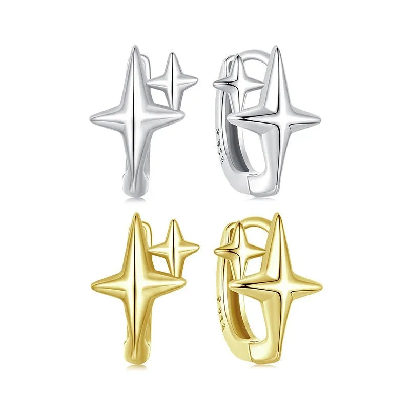 Minimalist star sterling silver ear clips with oxidation finish and XINGX design element