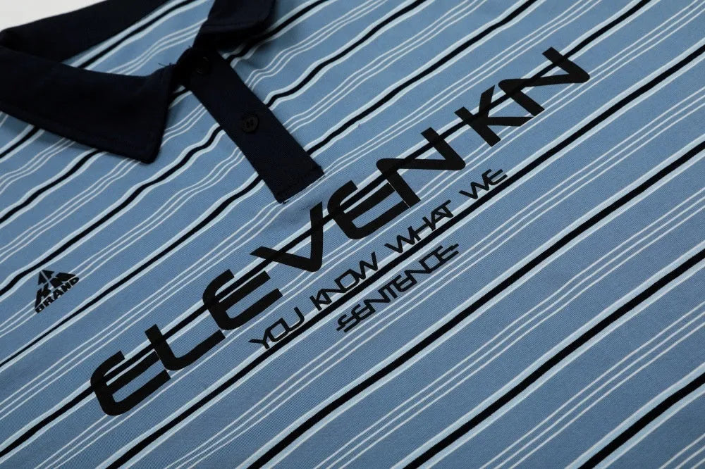 Blue and white vintage stripe pattern on a loose-fit men's short-sleeved cotton polo shirt.