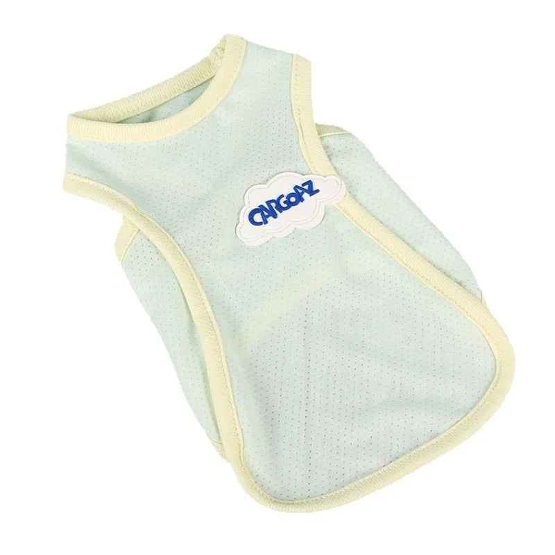 Grass green polyester cat vest for summer wear in size medium on grey background