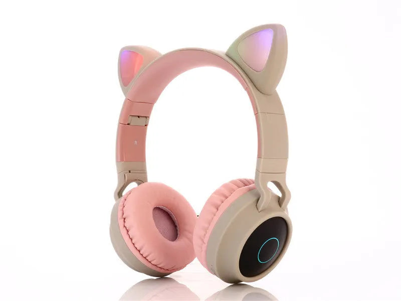 Cartoon cat ear wireless Bluetooth gaming headset shown in green, light blue, pink, purple, and skin tone colour options.